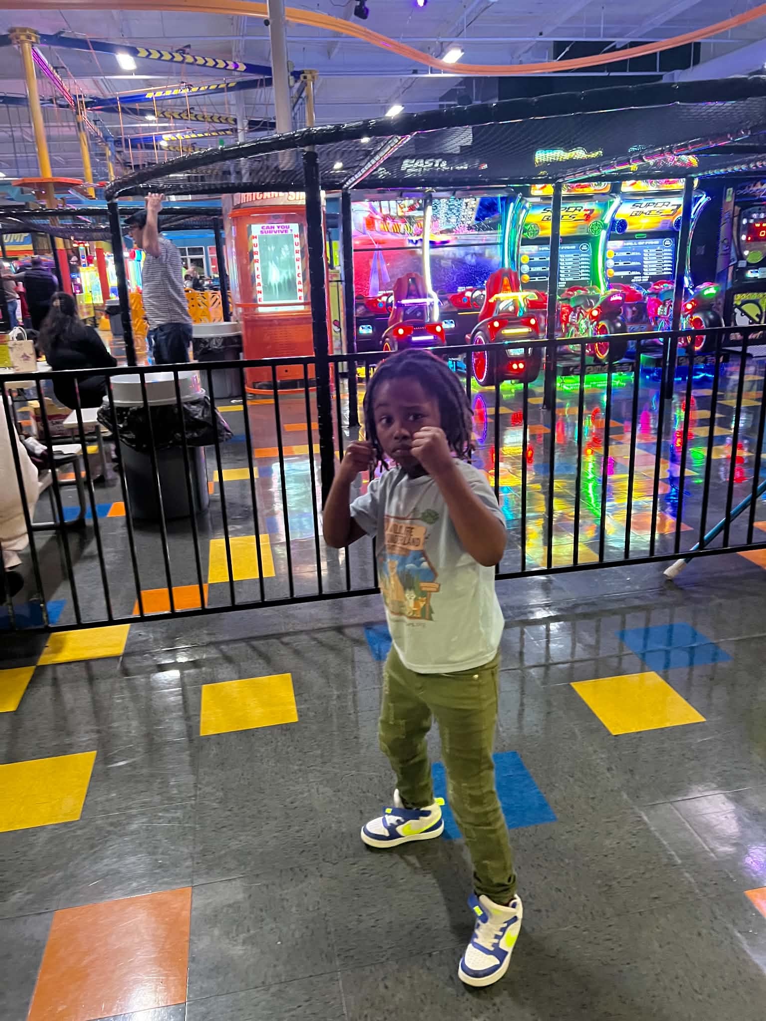 Child enjoying an arcade adventure