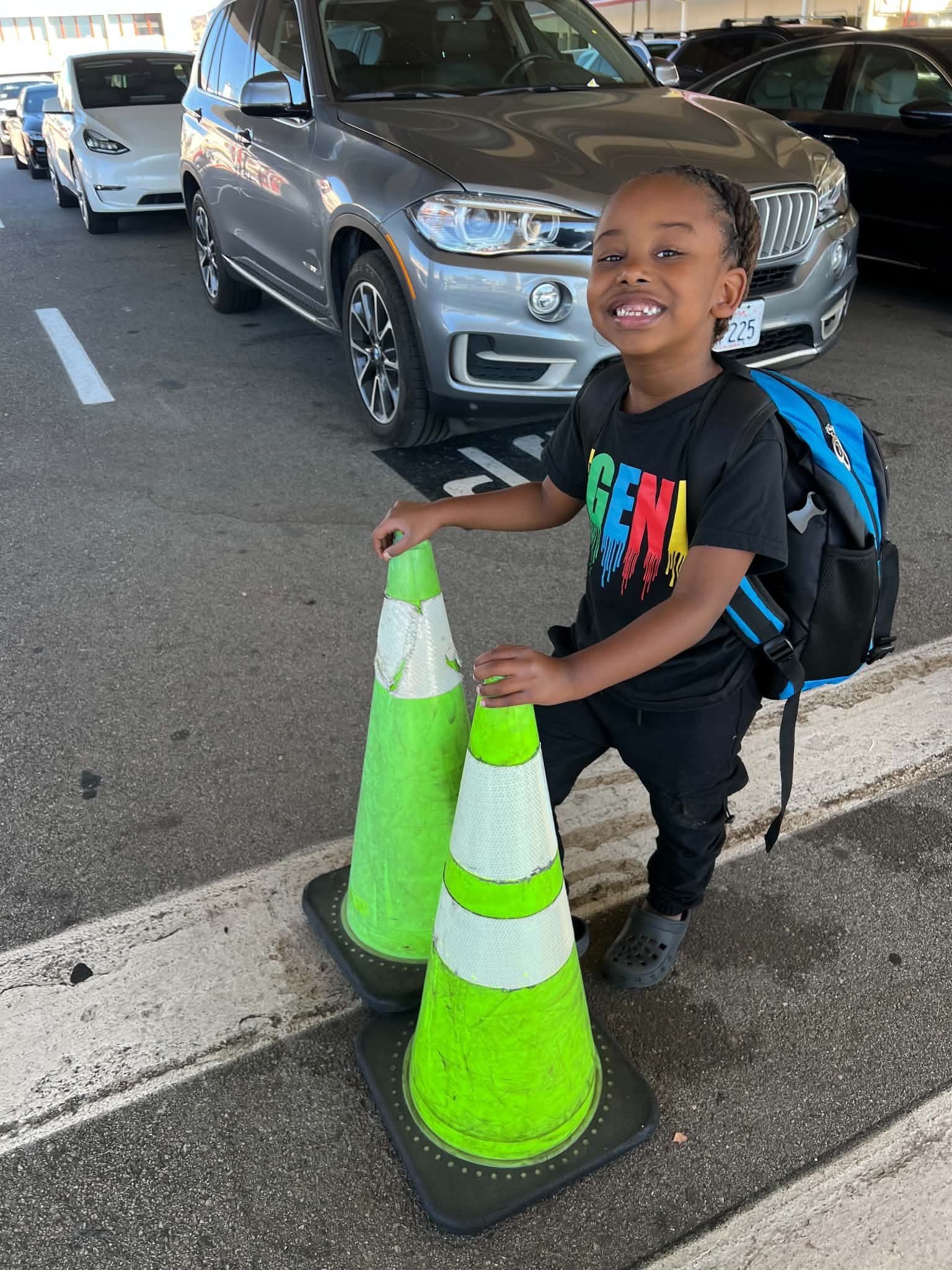 Child with a backpack ready for an adventure