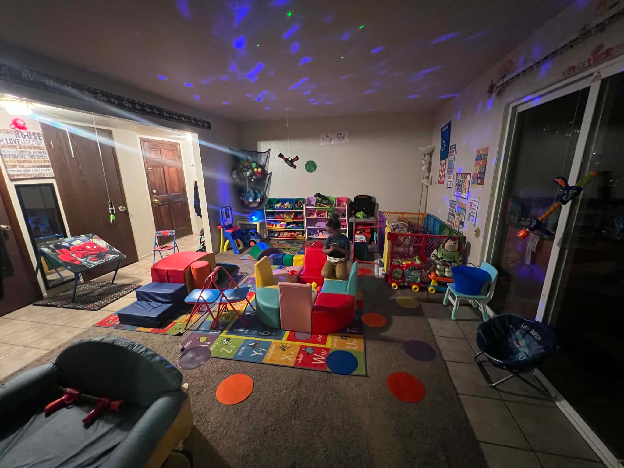 Colorful children’s playroom with activity areas and toys