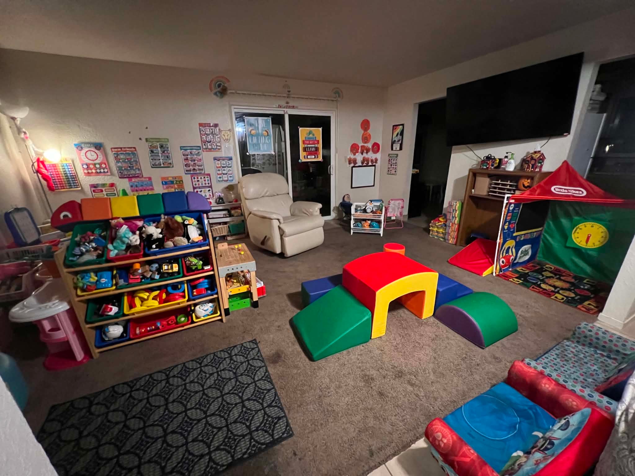 Colorful children’s playroom with learning and activity areas