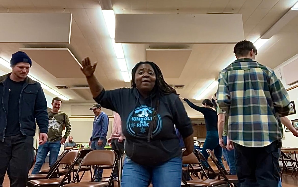 Community members enjoying a dance celebration