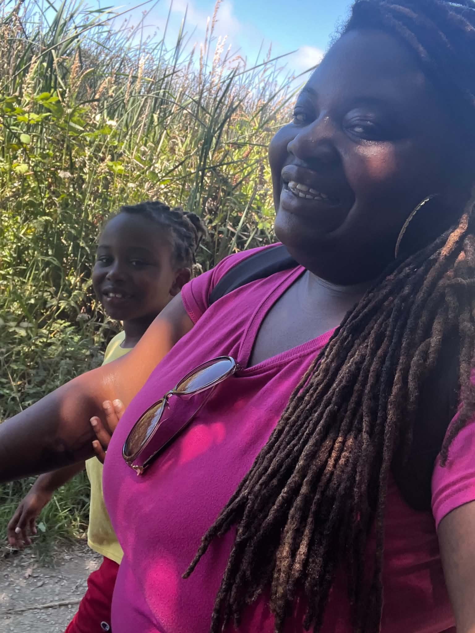 Adult and child enjoying a nature walk together