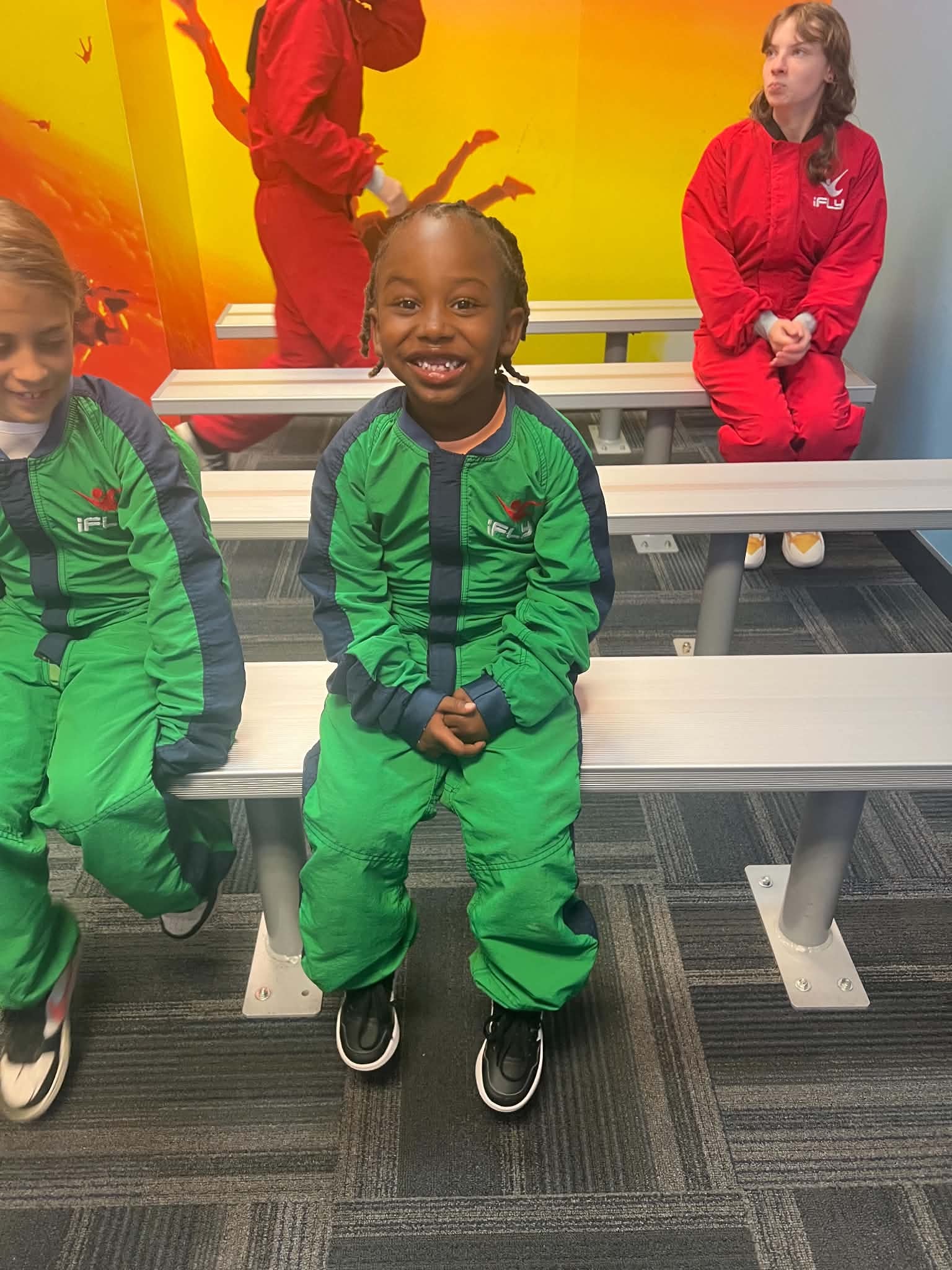 Children ready for an indoor skydiving activity