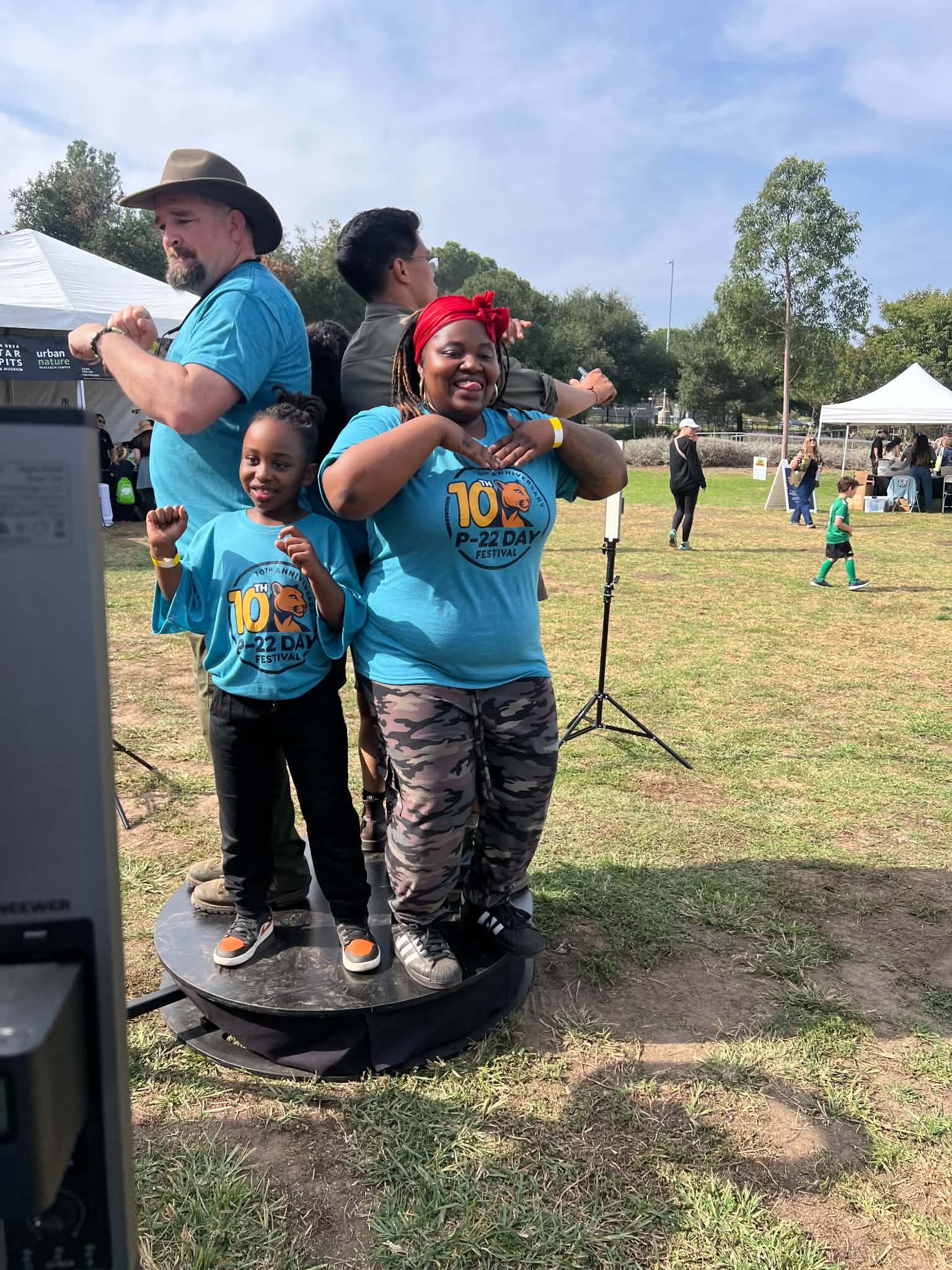 Community members celebrating together at the P-22 Day Festival