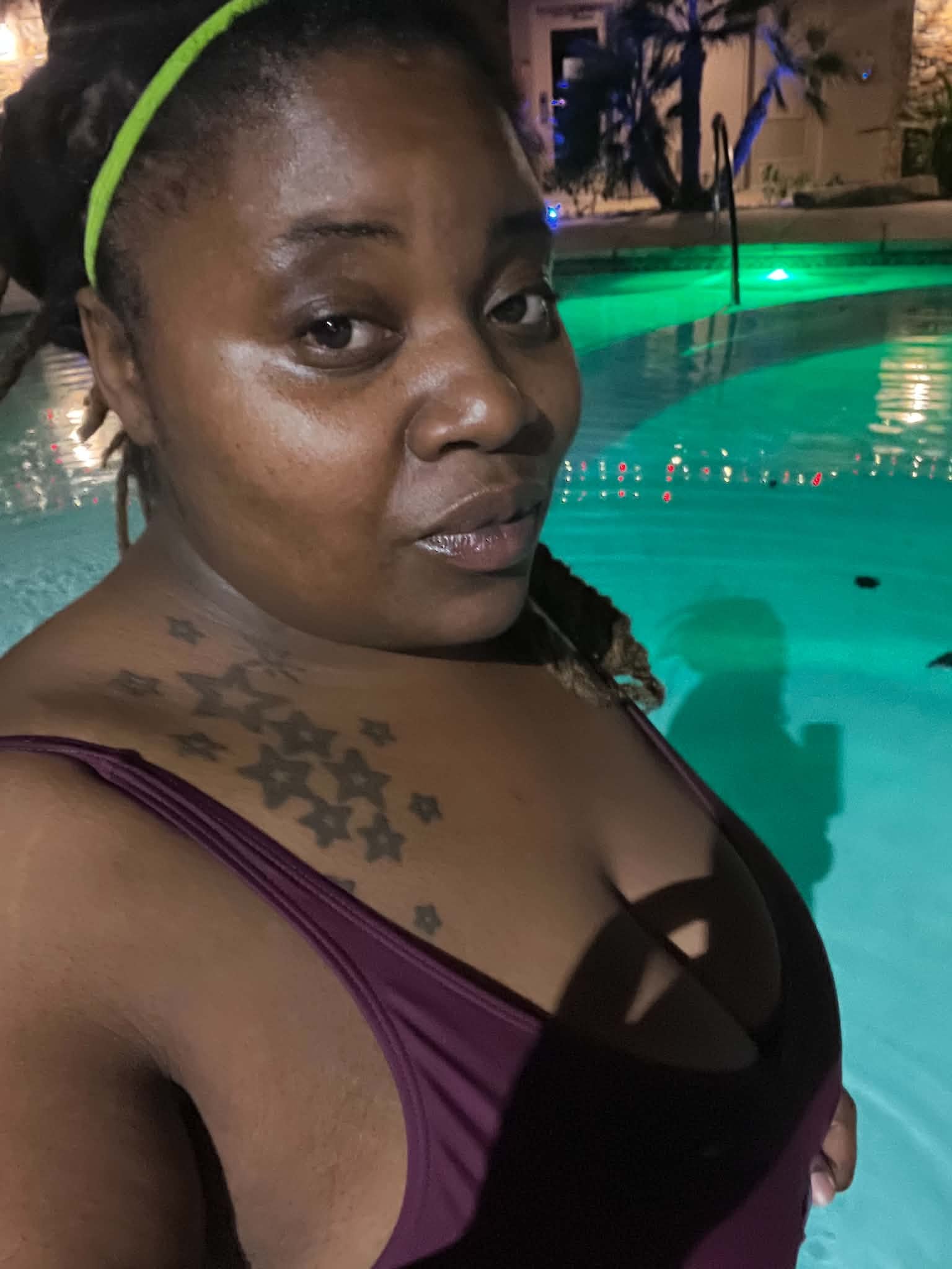 Community member enjoying a poolside moment