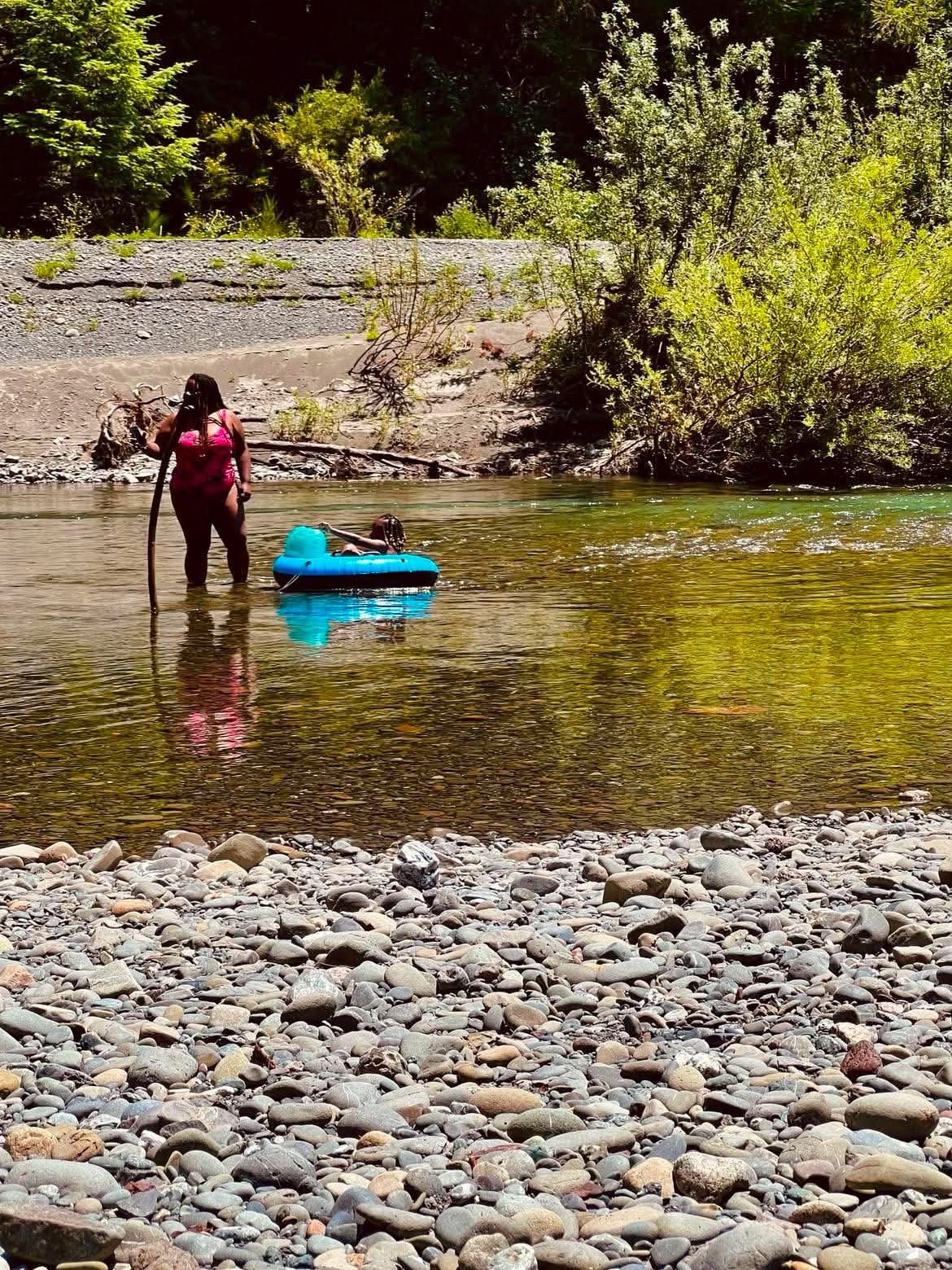 Family enjoying a calm river adventure together