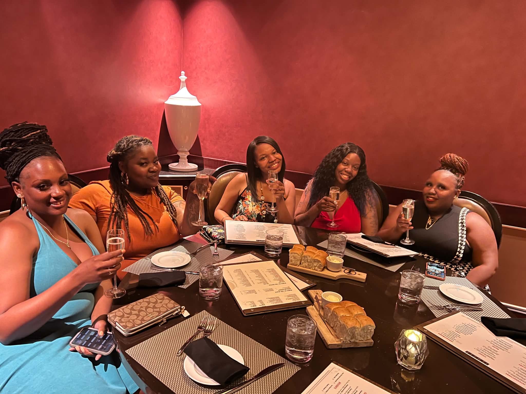 Women sharing a community dinner together